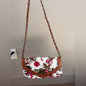 Floral over the shoulder clutch bag with chain